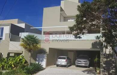 Imagem: A casa possui 5 Dormitórios, 5 Banheiros, 5 Vagas na garagem