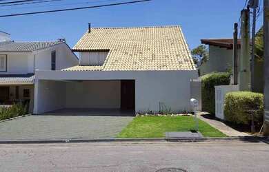 Imagem: A casa em condomínio possui 4 Dormitórios, 5 Banheiros, 2