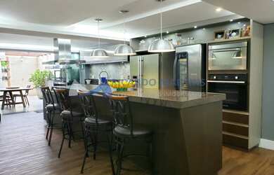 Imagem: A casa em condomínio possui 3 Dormitórios, 4 Banheiros, 2