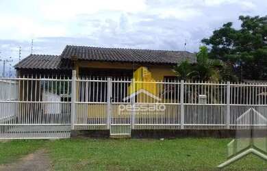 Imagem: A casa possui 2 Dormitórios, 1 Banheiro, 1 Vaga na garagem