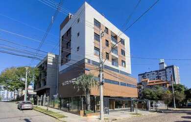 Imagem: O apartamento possui 1 Dormitório, 1 Banheiro, 1 Vaga na garagem