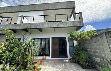 Imagem: A casa possui 2 Dormitórios, 1 Banheiro, 1 Vaga na garagem