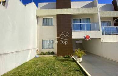 Imagem: A casa possui 4 Dormitórios, 3 Banheiros, 5 Vagas na garagem