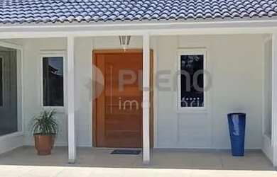 Imagem: A casa possui 4 Dormitórios, 5 Banheiros, 5 Vagas na garagem