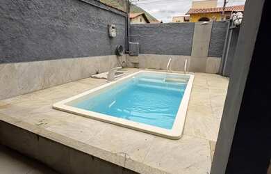 Imagem: A casa em condomínio possui 4 Dormitórios, 3 Banheiros, 2