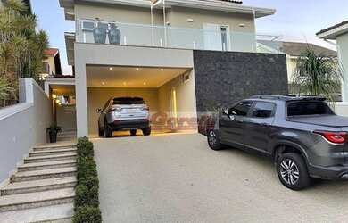 Imagem: A casa em condomínio possui 4 Dormitórios, 4 Banheiros, 2