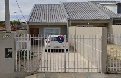 Imagem: A casa possui 2 Dormitórios, 1 Banheiro, 2 Vagas na garagem