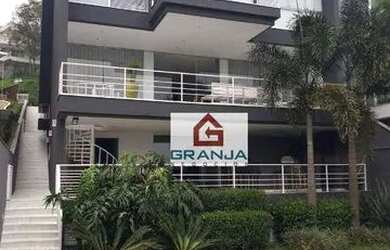 Imagem: A casa em condomínio possui 4 Dormitórios, 5 Banheiros, 4