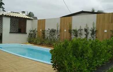 Imagem: A casa possui 2 Dormitórios, 2 Banheiros, 4 Vagas na garagem