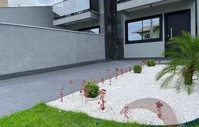 Imagem: A casa possui 2 Dormitórios, 1 Banheiro, 2 Vagas na garagem