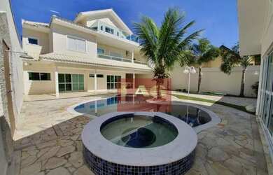 Imagem: A casa em condomínio possui 4 Dormitórios, 5 Banheiros, 5