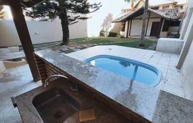 Imagem: A casa possui 3 Dormitórios, 5 Banheiros, 5 Vagas na garagem