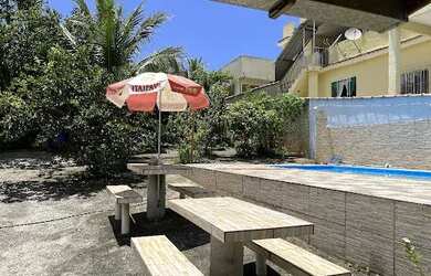 Imagem: A casa possui 3 Dormitórios, 3 Banheiros, 3 Vagas na garagem