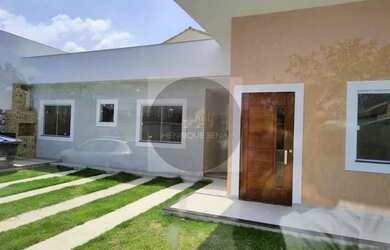 Imagem: A casa possui 3 Dormitórios, 2 Banheiros, 3 Vagas na garagem