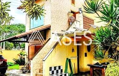 Imagem: A casa possui 3 Dormitórios, 5 Banheiros, 3 Vagas na garagem