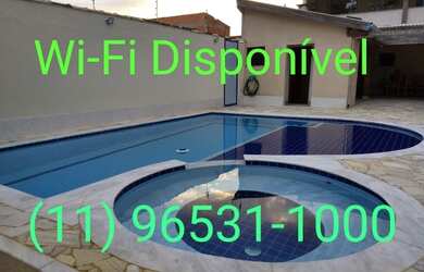 Imagem: A casa possui 3 Dormitórios e 3 Vagas na garagem e está localizado