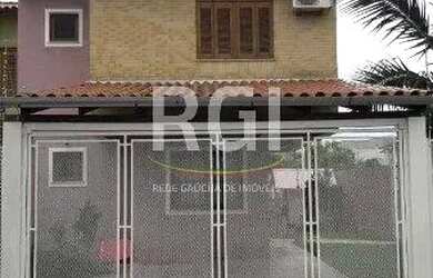 Imagem: A casa possui 3 Dormitórios, 3 Banheiros, 2 Vagas na garagem