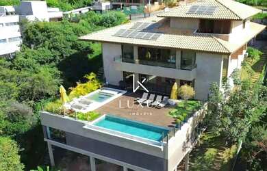 Imagem: A casa em condomínio possui 5 Dormitórios, 5 Banheiros, 4