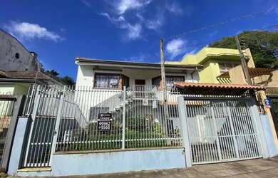 Imagem: A casa possui 3 Dormitórios, 5 Banheiros, 5 Vagas na garagem