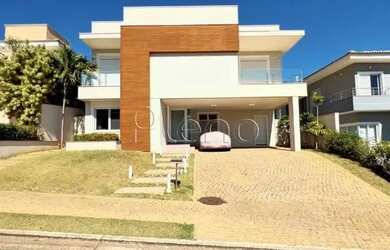 Imagem: A casa em condomínio possui 4 Dormitórios, 5 Banheiros, 4