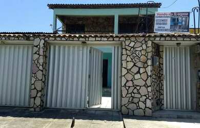 Imagem: A casa possui 3 Dormitórios, 2 Vagas na garagem e 97m² de