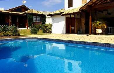 Imagem: A casa em condomínio à venda possui 4 Dormitórios, 4 Banheiros