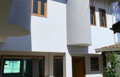 Imagem: A casa possui 3 Dormitórios, 5 Banheiros, 5 Vagas na garagem