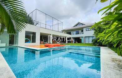 Imagem: A casa em condomínio possui 5 Dormitórios, 5 Banheiros, 4