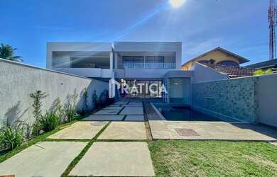 Imagem: A casa em condomínio possui 4 Dormitórios, 4 Banheiros, 3