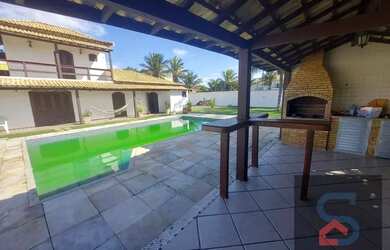 Imagem: A casa possui 4 Dormitórios, 4 Banheiros, 4 Vagas na garagem