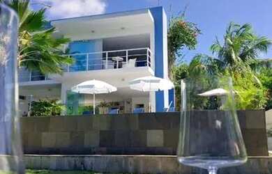 Imagem: A casa em condomínio possui 4 Dormitórios, 4 Banheiros, 2