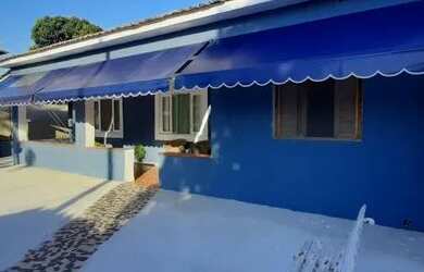 Imagem: A casa possui 4 Dormitórios, 1 Banheiro, 1 Vaga na garagem