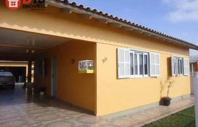 Imagem: A casa possui 3 Dormitórios, 1 Banheiro, 3 Vagas na garagem