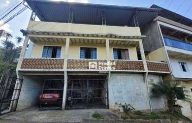 Imagem: A casa possui 3 Dormitórios, 1 Banheiro, 2 Vagas na garagem