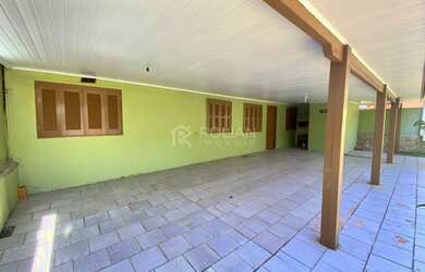 Imagem: A casa possui 4 Dormitórios, 3 Banheiros, 72m² de Área, Churrasqueira