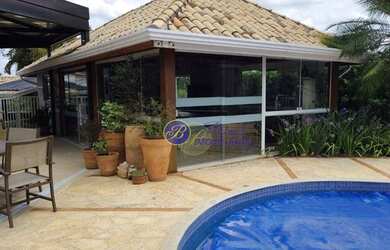 Imagem: A casa em condomínio à venda possui 4 Dormitórios, 4 Banheiros