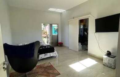 Imagem: A casa possui 5 Dormitórios, 5 Banheiros, 5 Vagas na garagem