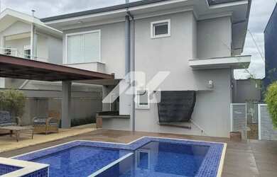 Imagem: A casa em condomínio para alugar possui 3 Dormitórios, 5 Banheiros