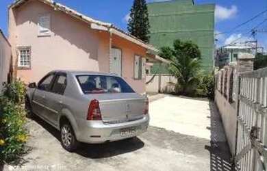 Imagem: A casa possui 2 Dormitórios, 1 Banheiro, 2 Vagas na garagem