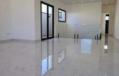 Imagem: A casa possui 3 Dormitórios, 5 Banheiros, 4 Vagas na garagem