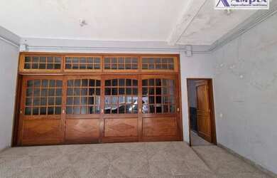 Imagem: A casa possui 4 Dormitórios, 5 Banheiros, 2 Vagas na garagem