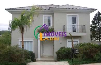 Imagem: A casa em condomínio possui 4 Dormitórios, 5 Banheiros, 4