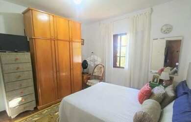 Imagem 7: Casa Ampla de 3 dormitórios sendo 1 suíte. Garagem coberta 2 carros. Pátio frente e fundos