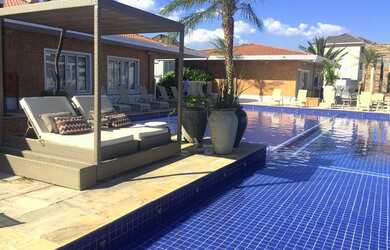 Imagem: A casa em condomínio possui 3 Dormitórios, 4 Banheiros, 4