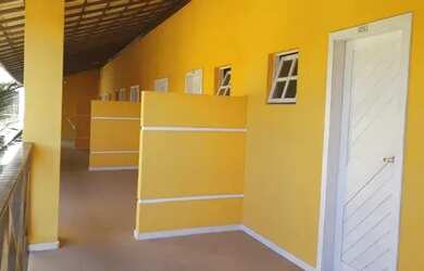 Imagem: A casa possui 5 Dormitórios, 5 Banheiros, 4 Vagas na garagem