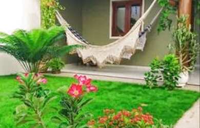 Imagem: A casa possui 3 Dormitórios, 2 Banheiros, 2 Vagas na garagem