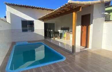 Imagem: A casa possui 2 Dormitórios, 2 Banheiros, 3 Vagas na garagem