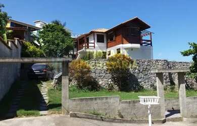 Imagem: A casa possui 3 Dormitórios, 2 Banheiros, 720m² de Área e