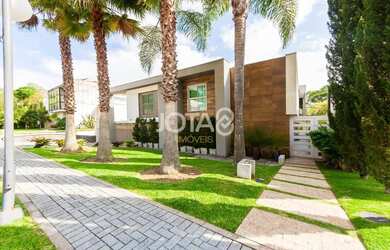 Imagem: A casa em condomínio possui 4 Dormitórios, 5 Banheiros, 5