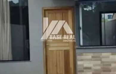 Imagem: A casa possui 2 Dormitórios, 1 Banheiro, 2 Vagas na garagem